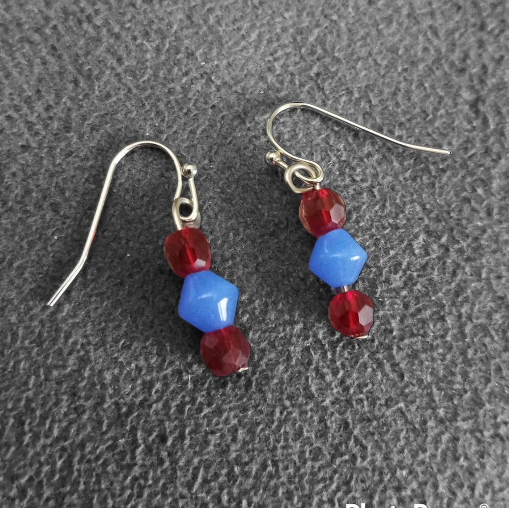 Hand crafted silver moonstone gemstone and red crystal drop statement earrings